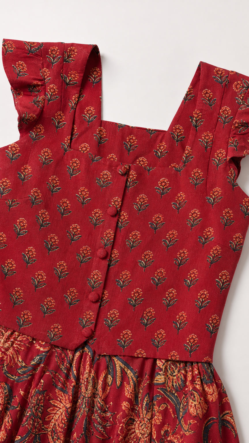 Close-up detail of Rust Red square neckline with front buttons and ruffle straps