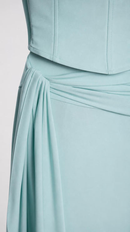 Close-up of fabric draping on the maxi skirt