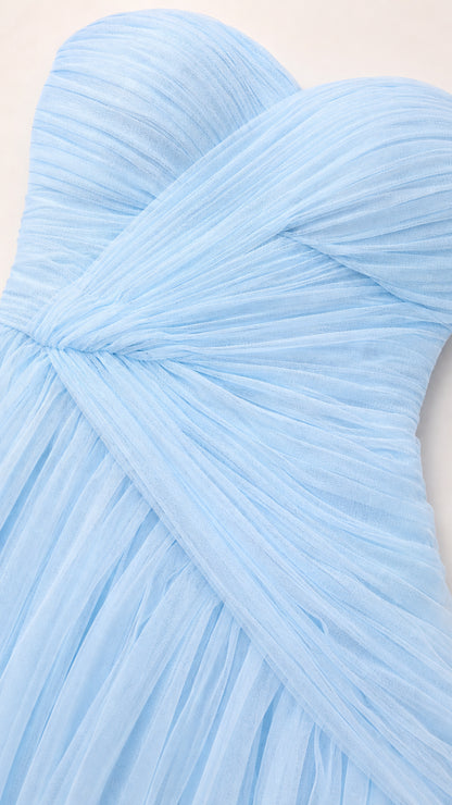 Close-up of asymmetrical ruching texture on light blue tulle bodice