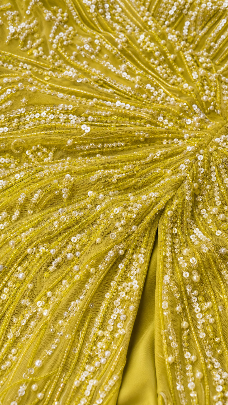 Close-up detail of radiant beadwork and sequin embroidery on Lime Green fabric