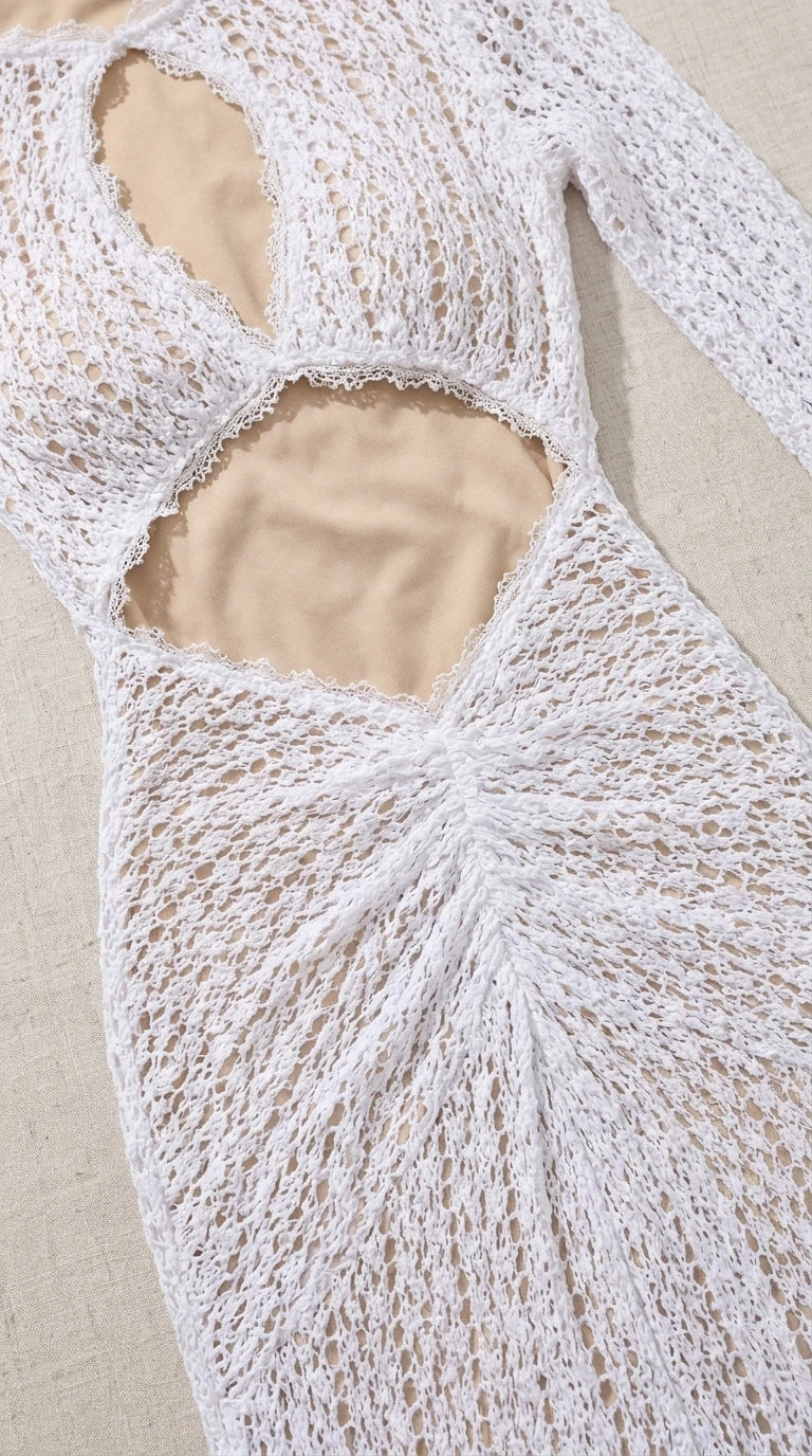 Close-up detail of front cutout and crochet texture on white dress