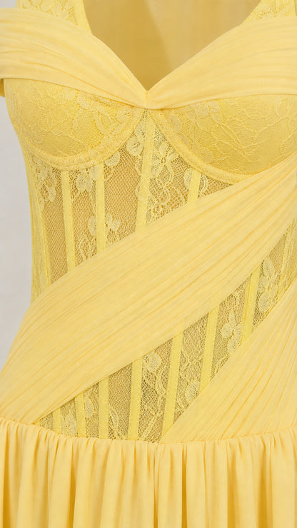 Close-up of yellow sheer lace corset bodice