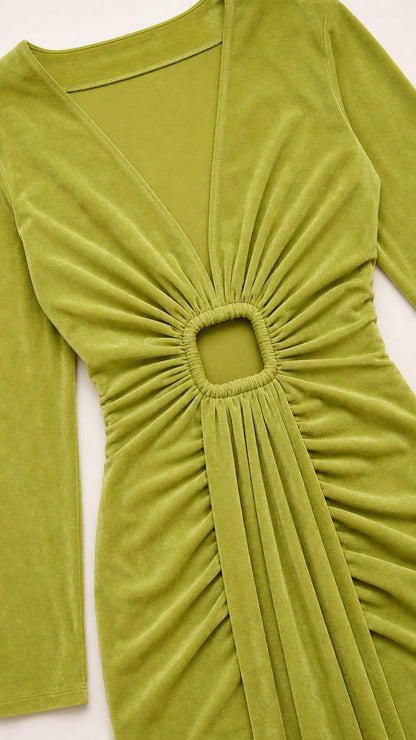 Close-up detail of Olive Green velvet dress featuring V-neck and ring cutout pleats