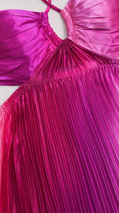 Close-up detail of halter neckline and accordion pleats