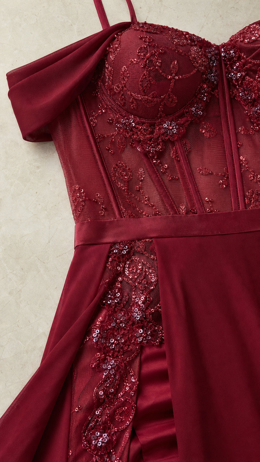Close-up of embroidered corset bodice and lace appliques