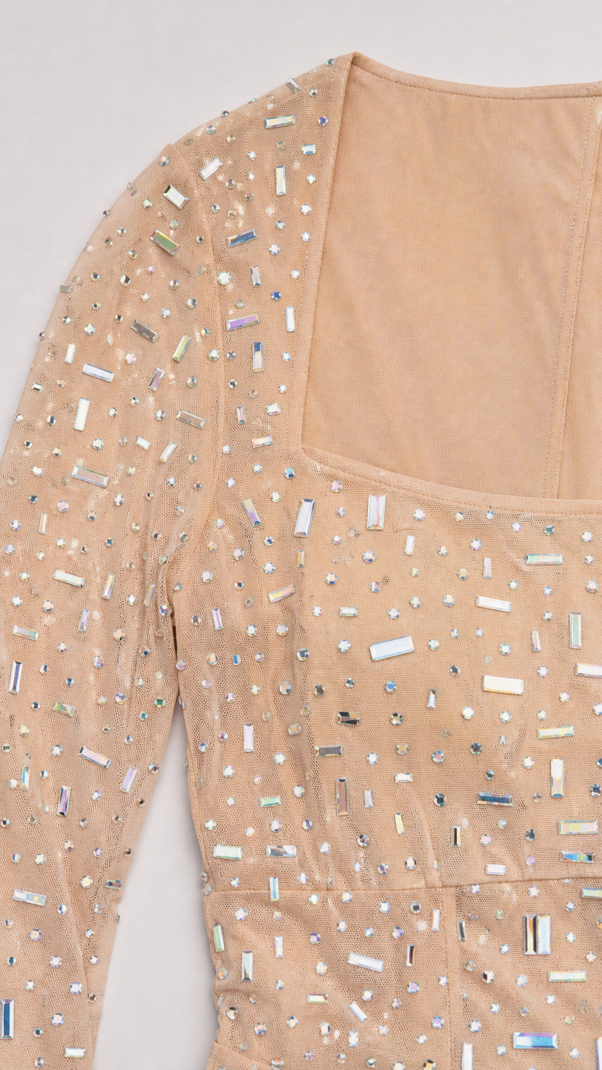 Close-up detail of square neckline and rhinestone embellishments