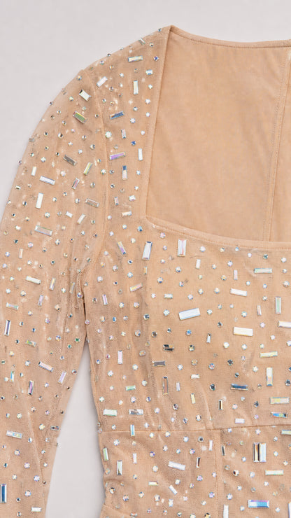 Close-up detail of square neckline and rhinestone embellishments
