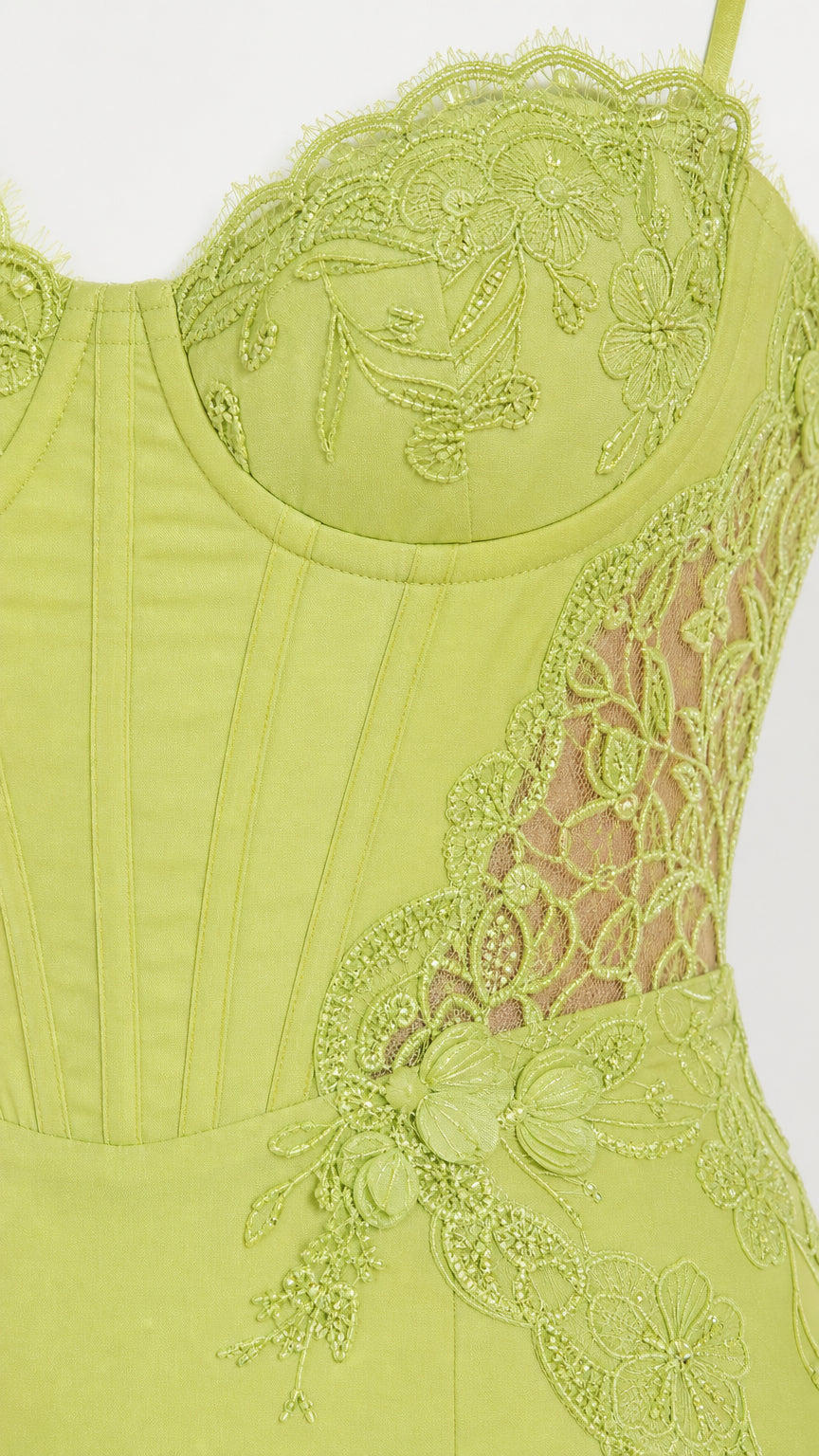 Close-up of bodice embroidery on lime dress