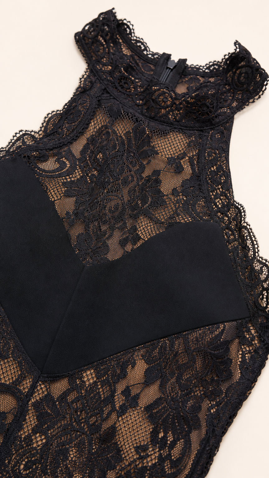 Close-up detail of floral lace and halter neckline