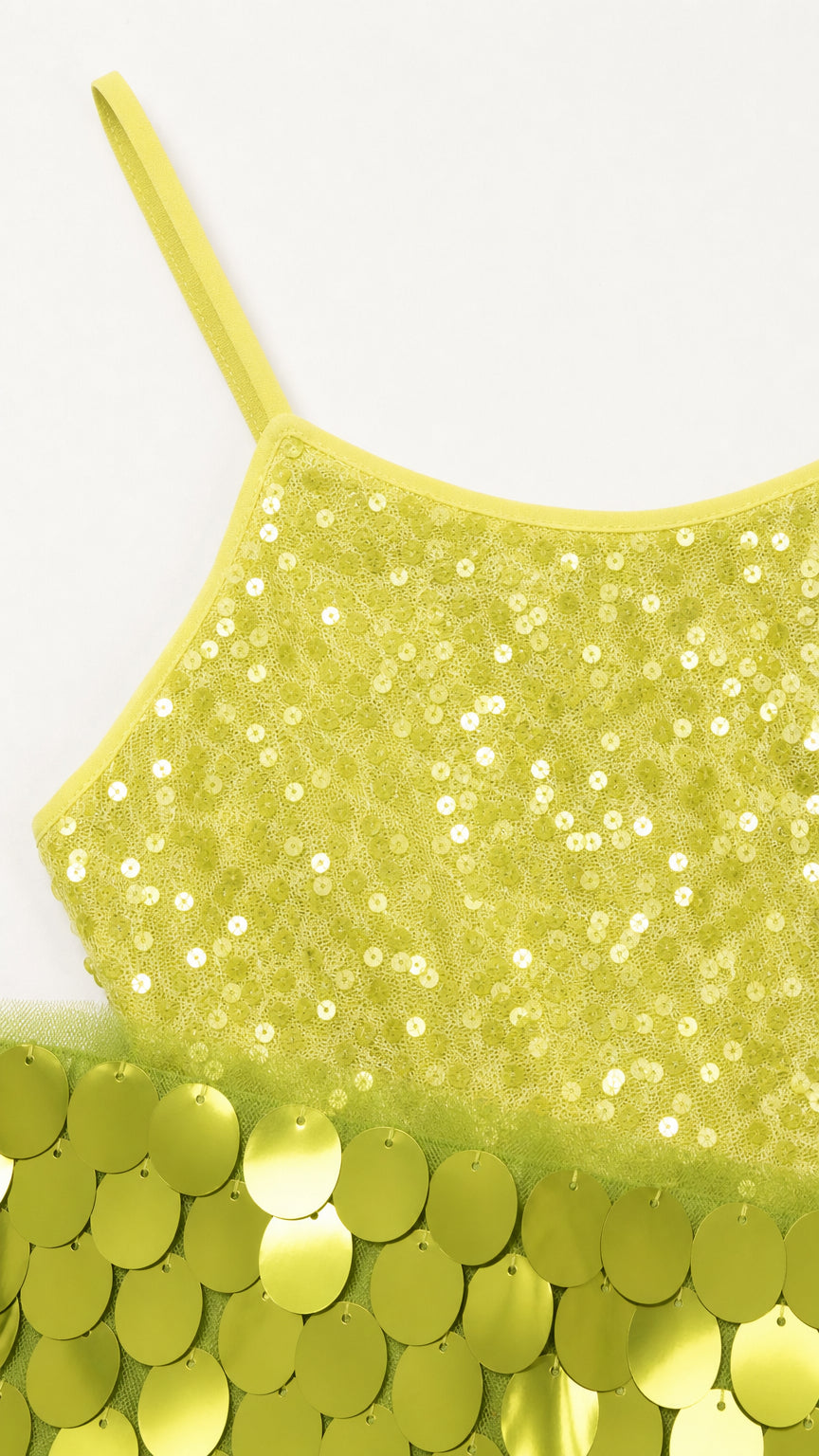 Close up of lime green sequin fabric and oversized sequin hem