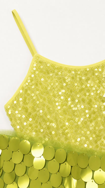 Close up of lime green sequin fabric and oversized sequin hem