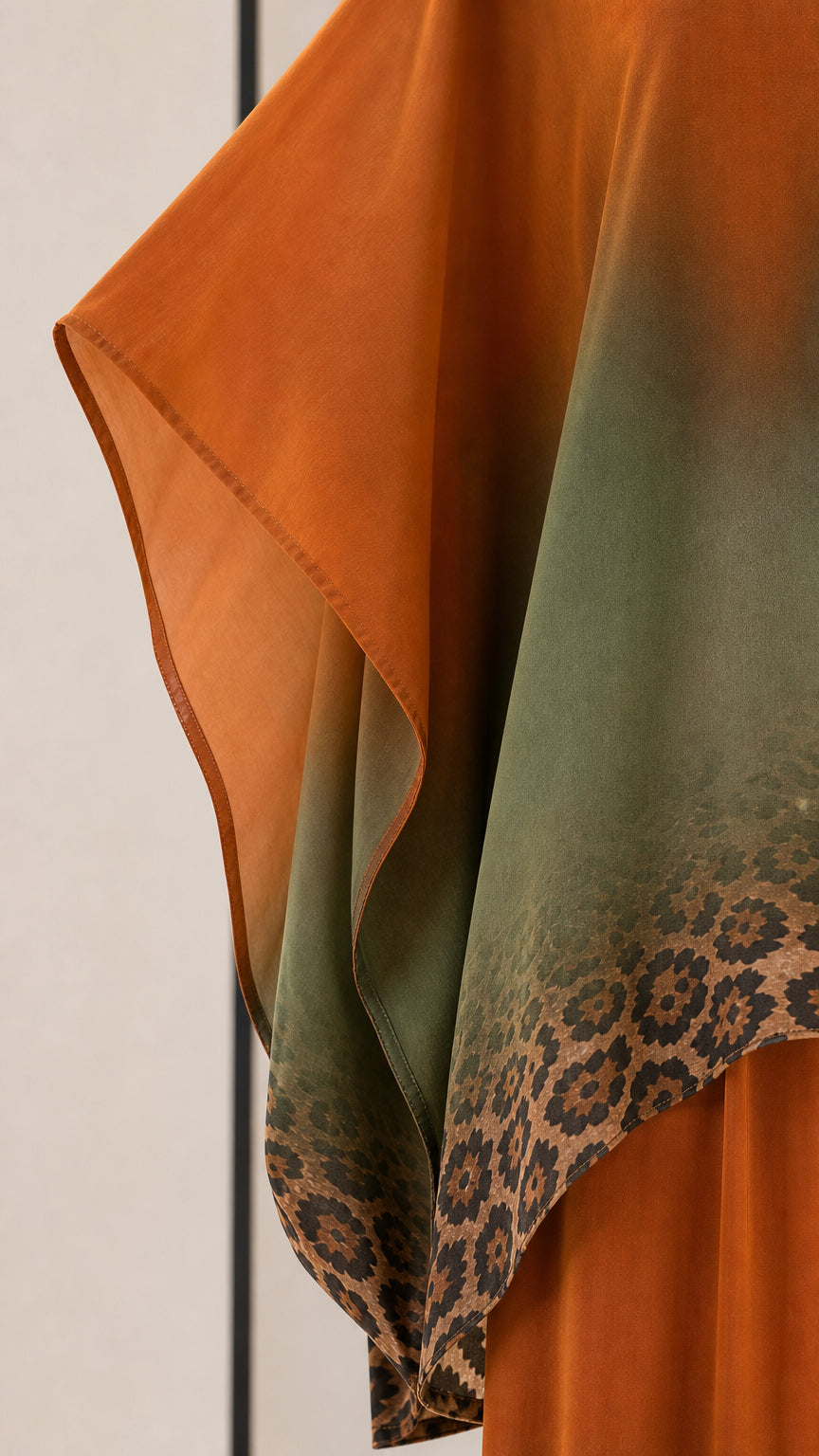 Close-up detail of fabric drape and leopard print hem