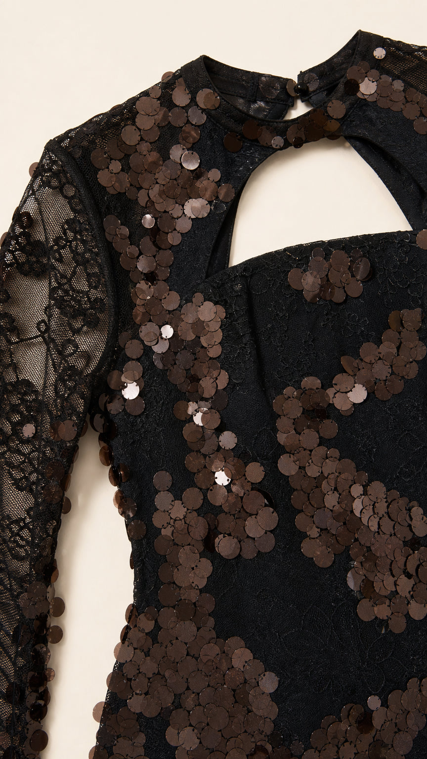 Close-up of sequin pattern and neckline cutout