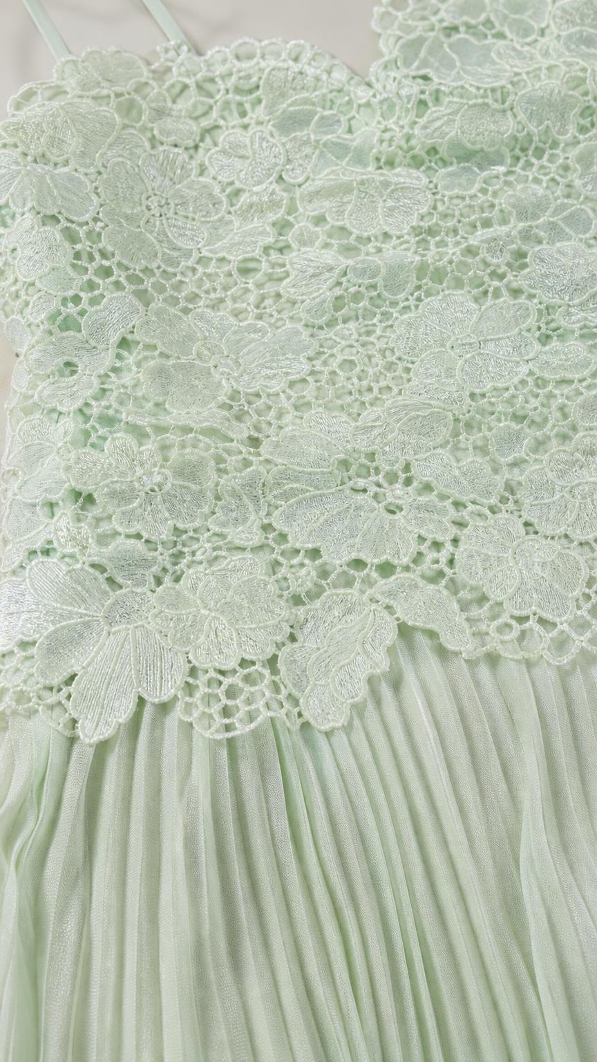 Close-up detail of mint floral lace bodice
