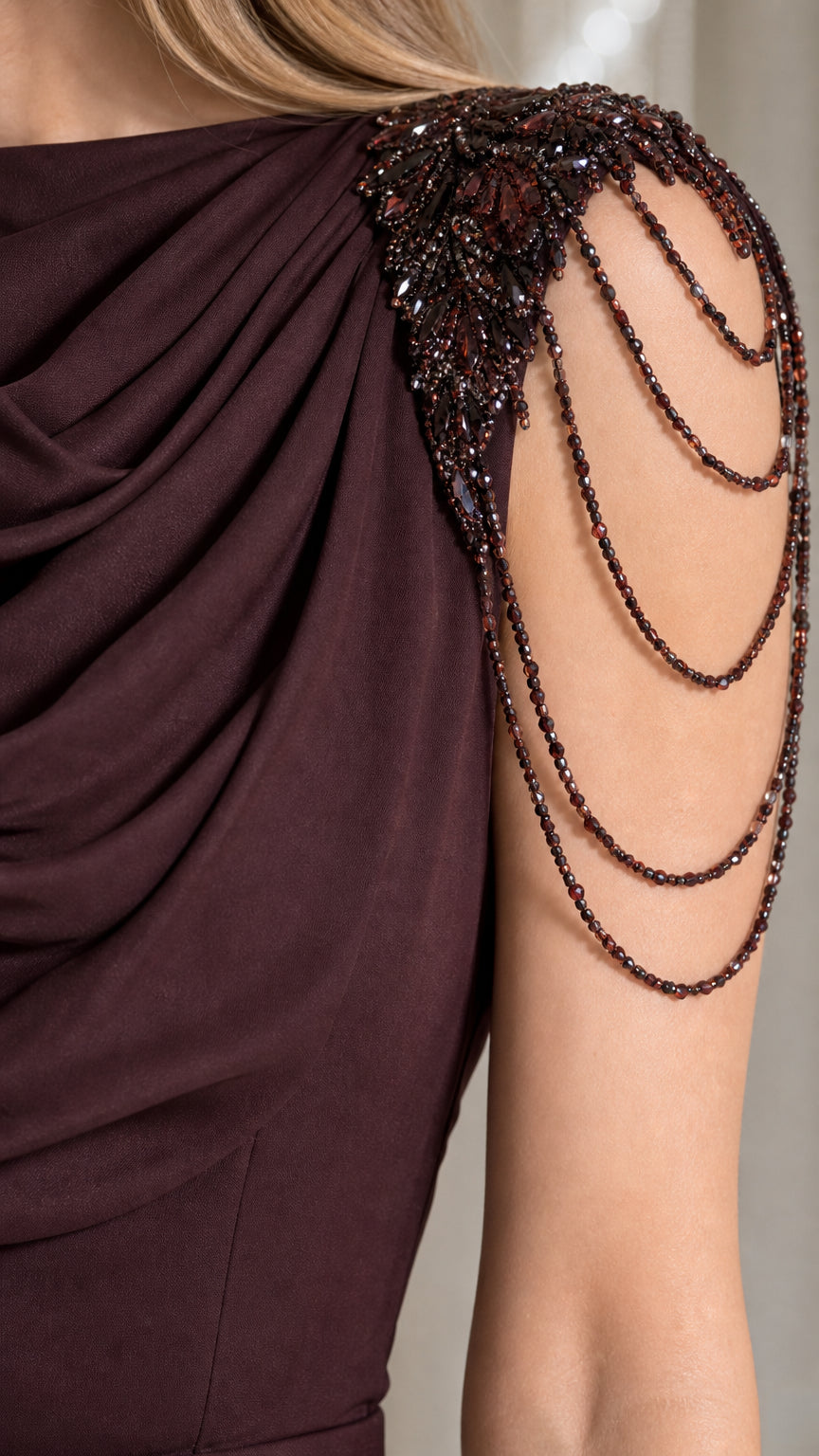 Close-up of beaded shoulder and drape detail