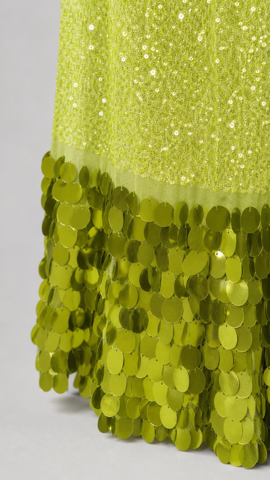 Close-up detail of oversized sequin hem
