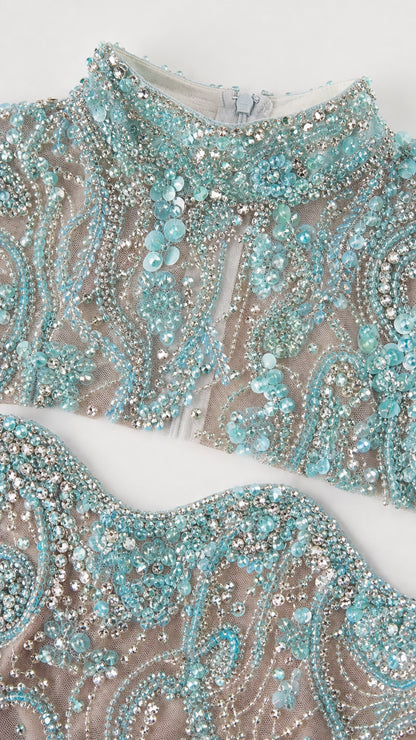 Close-up detail of high neckline and intricate sequin beadwork