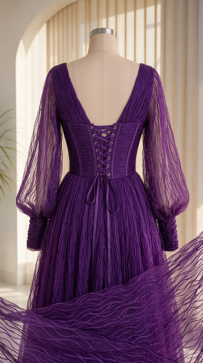 Detailed back view of purple dress mannequin showing lace-up corset and pleated tulle