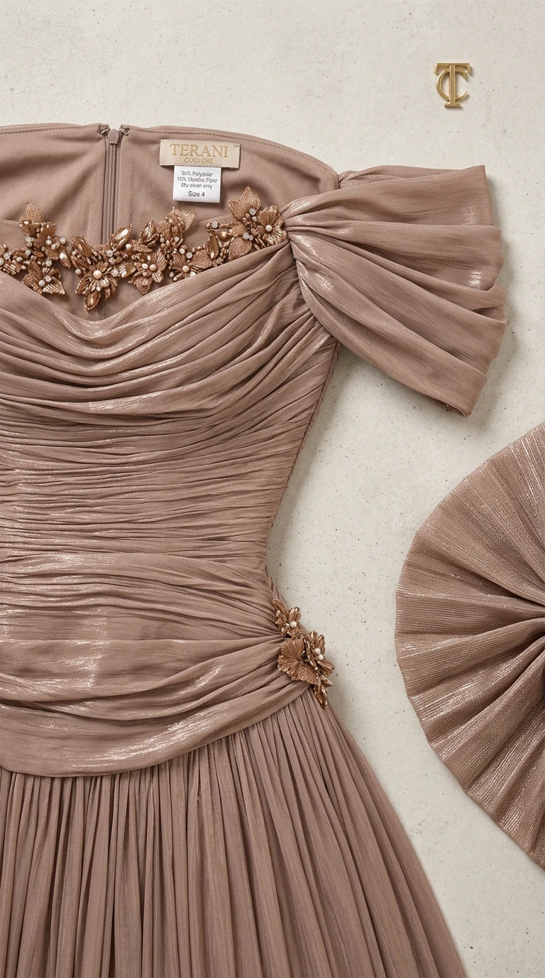 Close-up detail of beaded floral trim and ruched metallic bodice