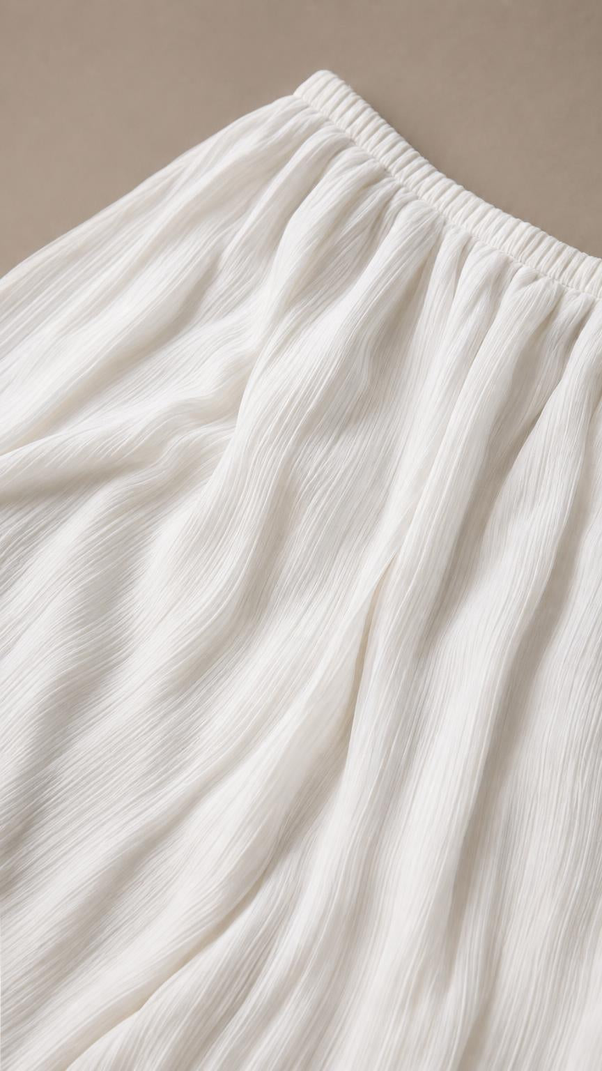 Close-up detail of white textured crinkled fabric
