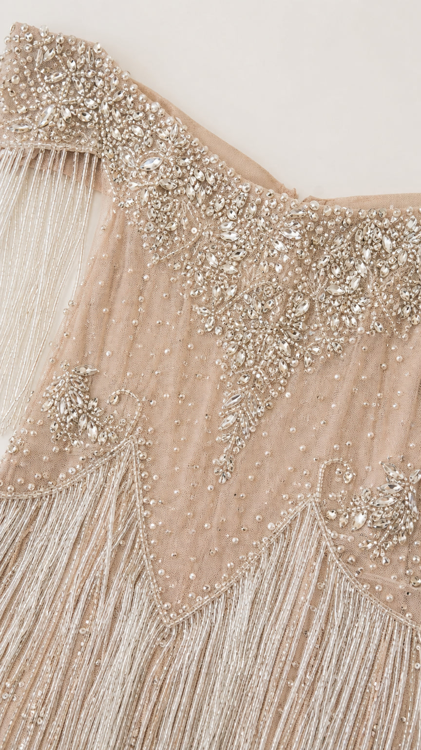 Close-up of crystal beadwork and fringe texture
