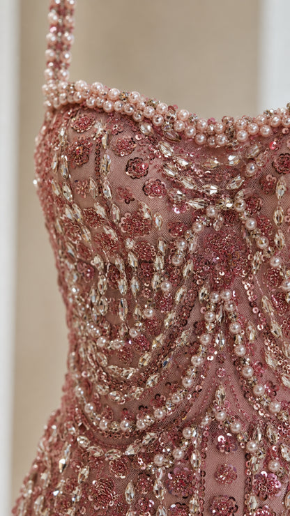 Close-up detail of beaded neckline and sequins on Dusty Rose dress