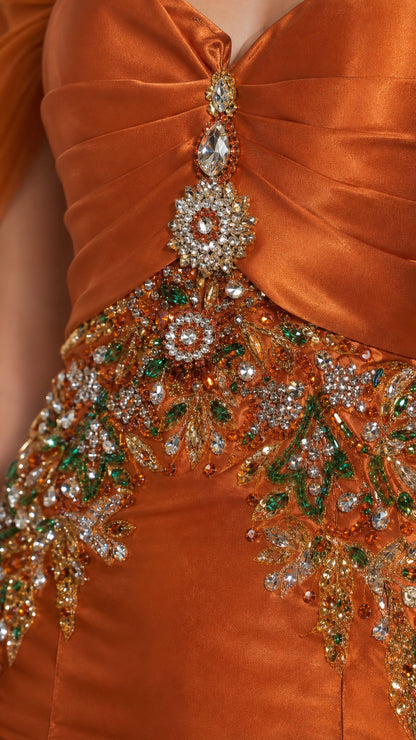 Close-up of intricate rhinestone and crystal beadwork on the bodice