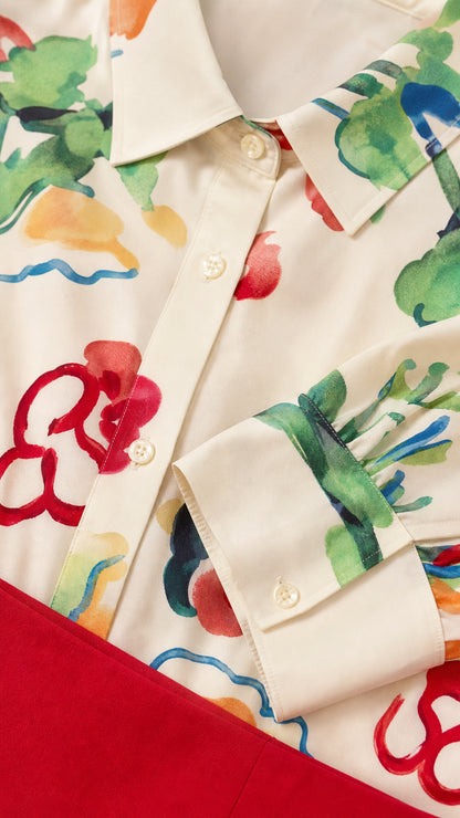Close up of shirt collar, buttons, and cuff details