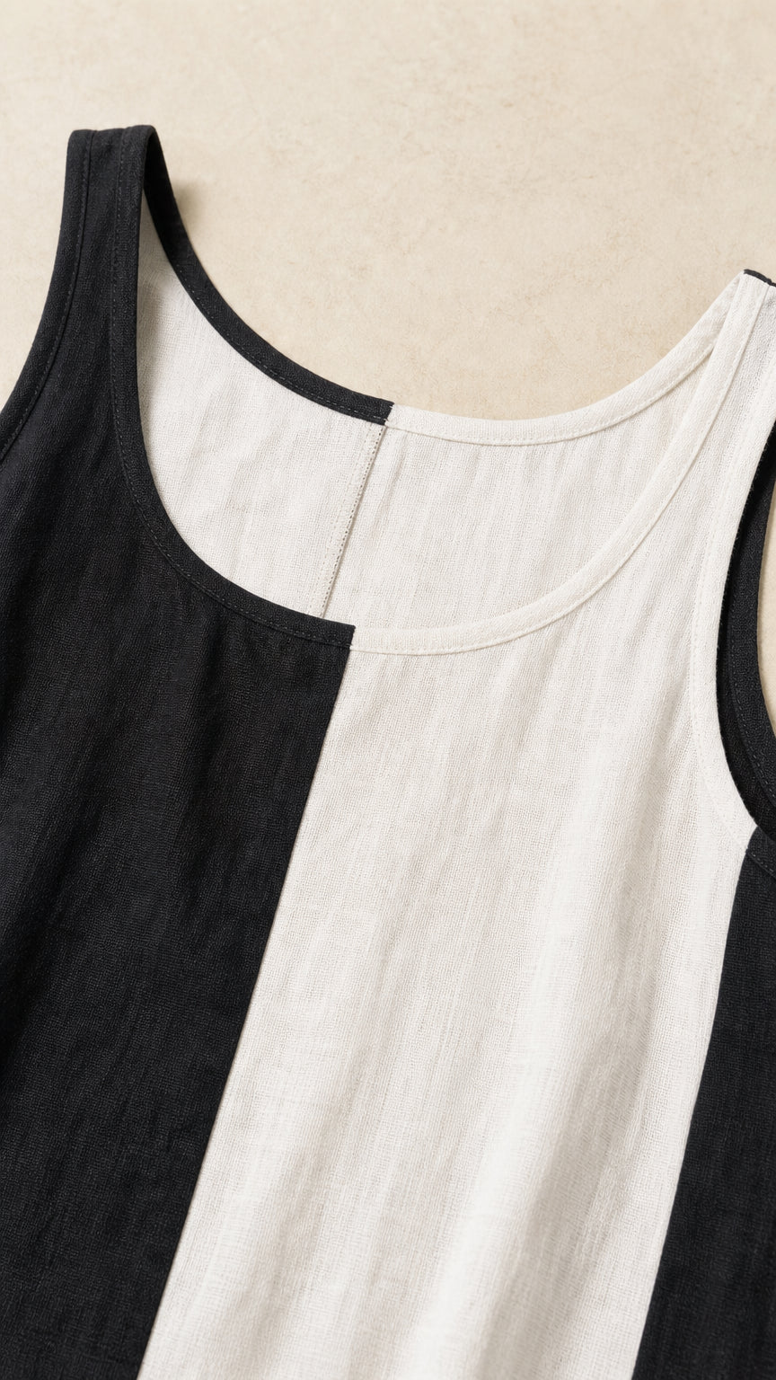 Close-up detail of scoop neckline and fabric texture