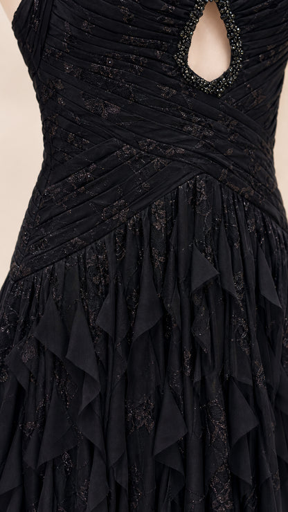 Close-up detail of the bodice, keyhole cutout, and textured fabric