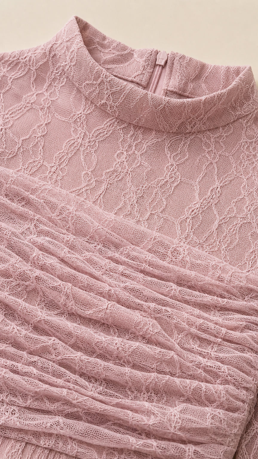 Close-up detail of mock neckline and ruched lace bodice