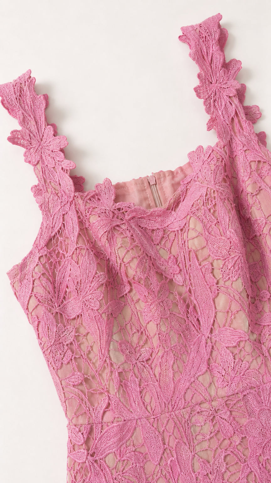 Close up of pink floral lace strap and square neckline