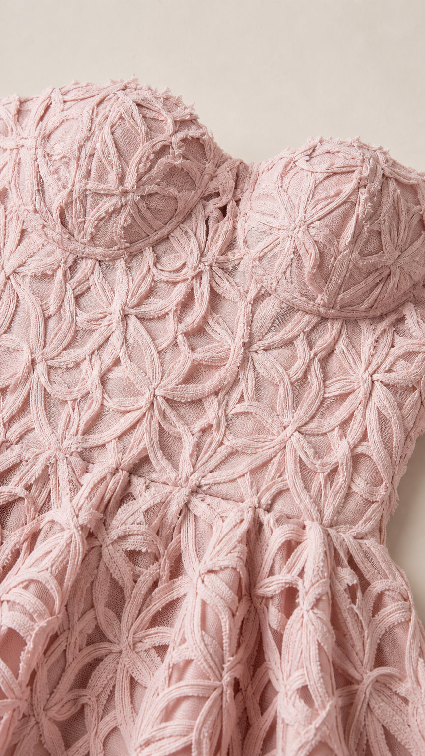 Close up of textured lace pattern and bustier detail