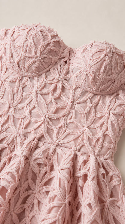 Close up of textured lace pattern and bustier detail
