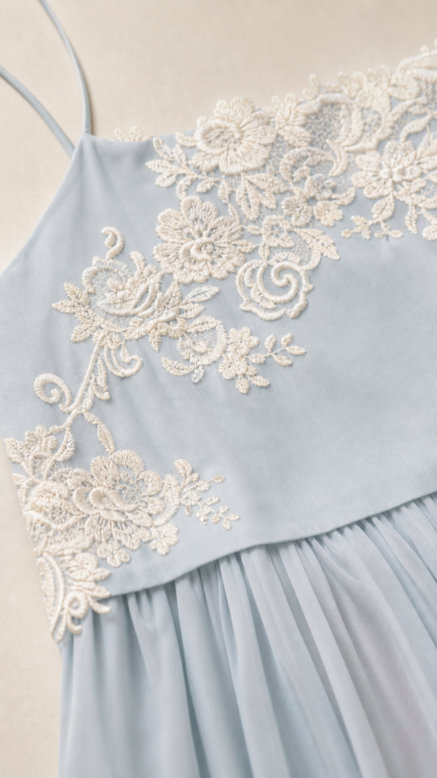 Close up of floral applique details on Light Blue dress