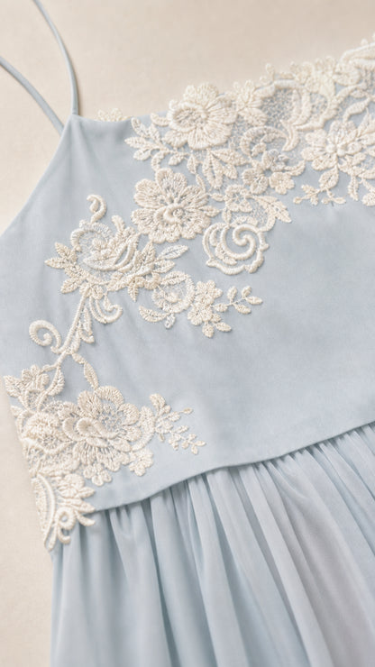 Close up of floral applique details on Light Blue dress