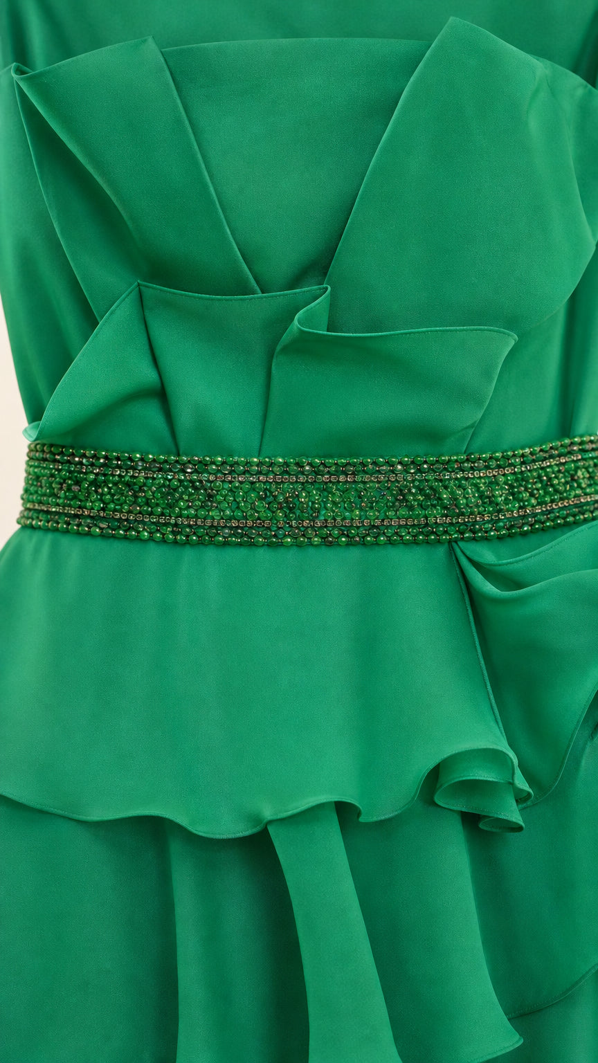 Close-up of beaded waist and ruffle details