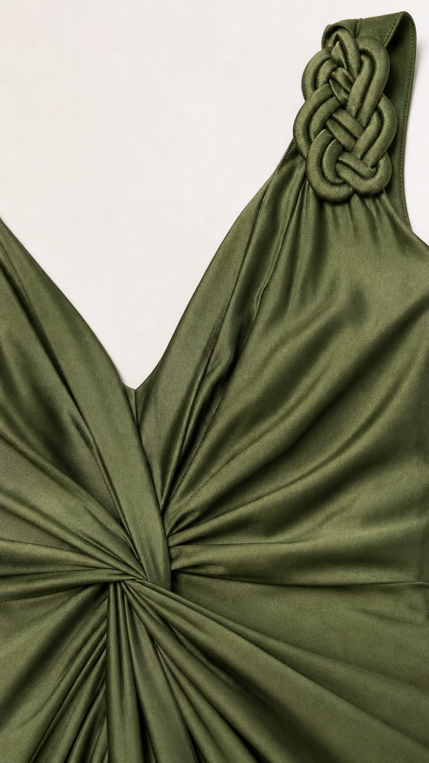 Close-up of braided strap and V-neckline on olive green dress
