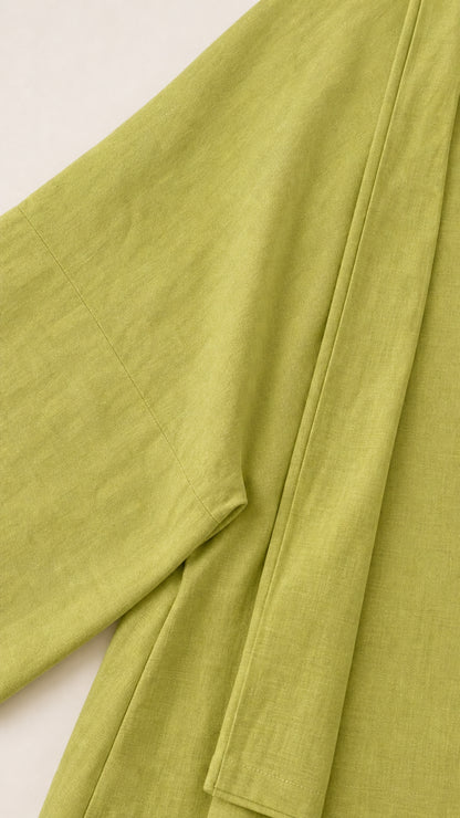 Close-up detail of textured linen-look weave fabric and clean seam construction