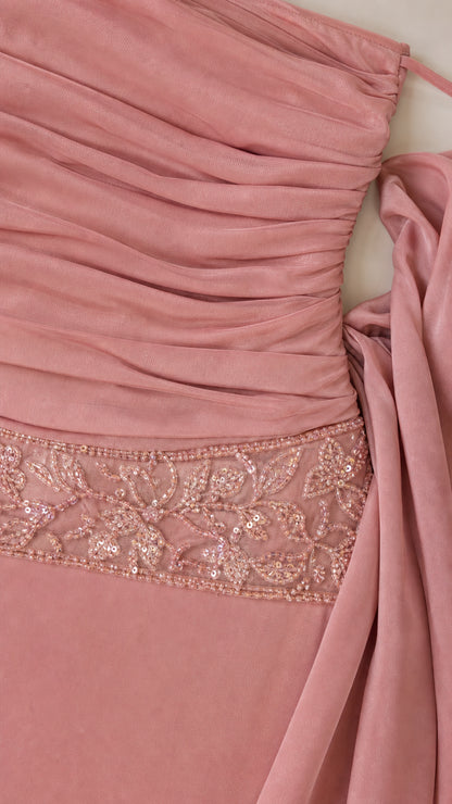 Close-up of ruched bodice and sequin embellished waist detail
