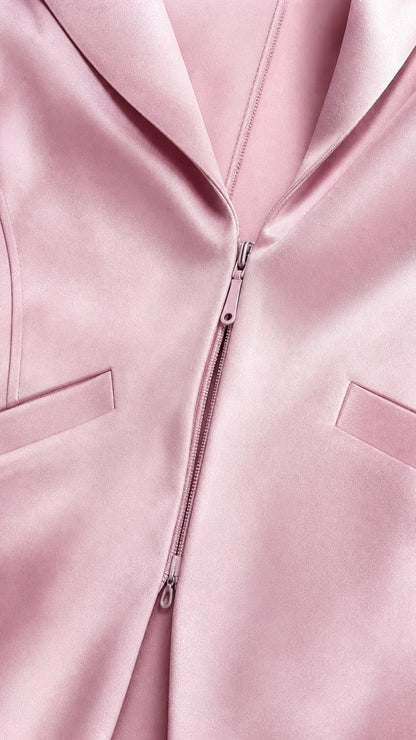 Close-up detail of blazer collar and front zipper closure