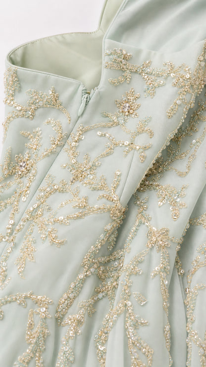 Close-up of bodice embroidery and zipper detail