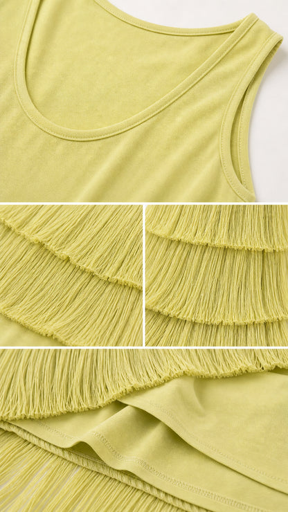 Close-up details of lime green knit fabric, neckline, and multi-tier fringe trim