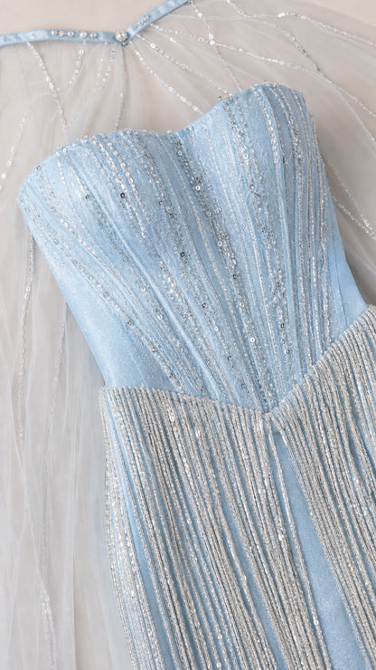 Close-up of light blue beaded corset sweetheart neckline and delicate fringe details