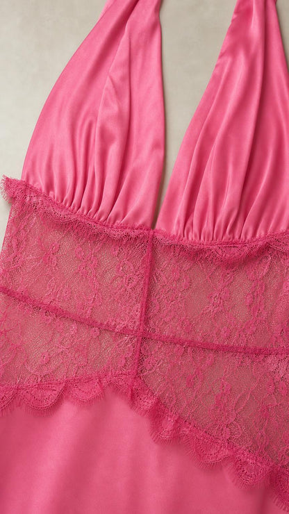 Close-up detail of lace bodice and halter neck on pink dress