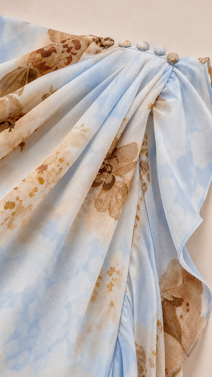 Close-up of shoulder button closure and ruffled fabric texture in Light Blue