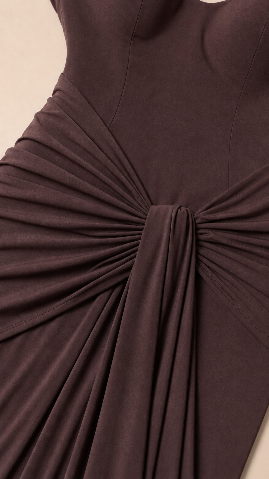 Close-up detail of front gathered knot and draping