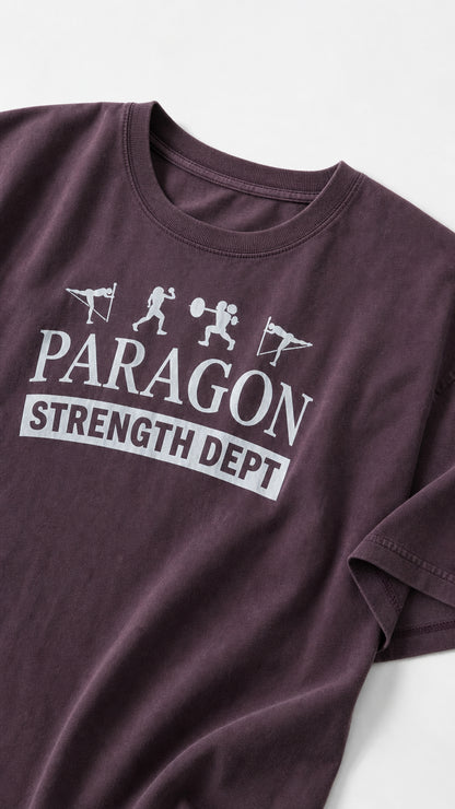 Close-up of chest graphic on Washed Plum t-shirt reading Paragon Strength Dept