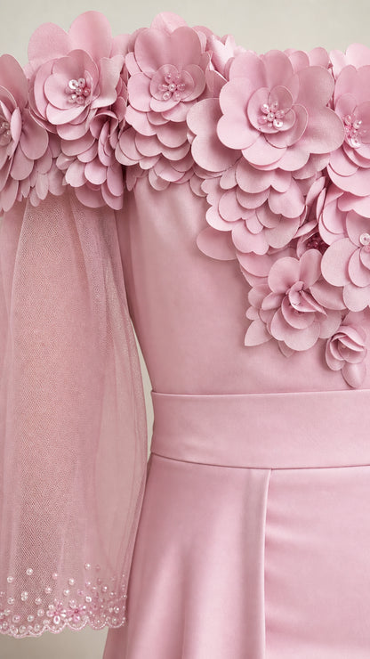 Close-up of 3D floral appliques and sheer sleeve