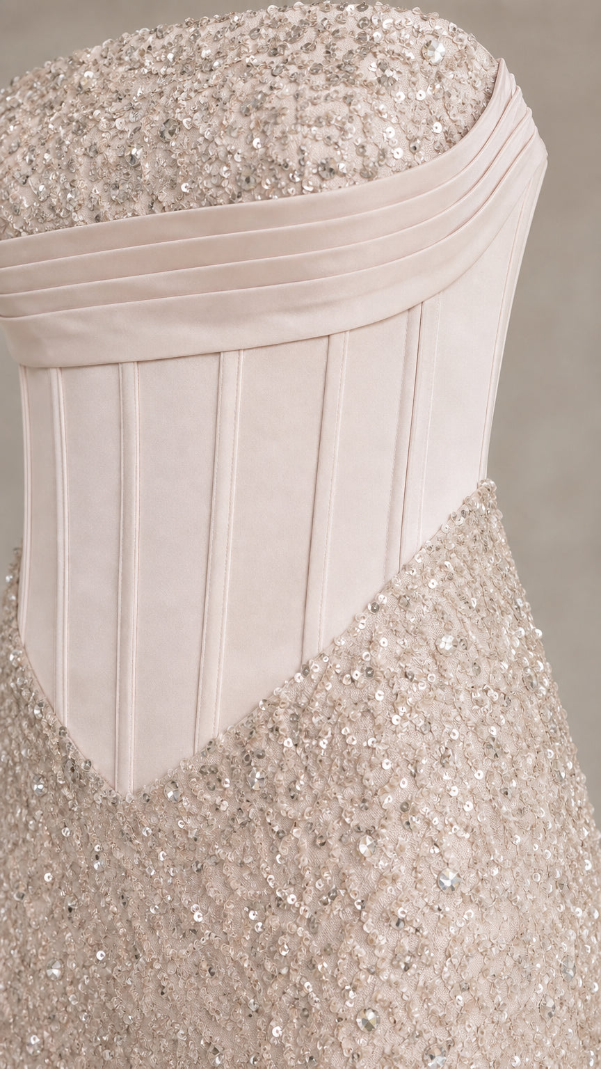Close-up detail of structured corset bodice and sequin texture